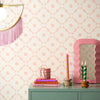 Roomset close-up of vintage flower petal, geometric wallpaper in candy floss pink and cream