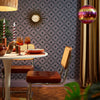 Roomset of vintage flower petal, geometric wallpaper in charcoal grey and lavender colourway