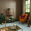 Roomset of Hornsea pattern wallpaper in earthy orange, pine and chocolate colourway