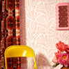 Roomset close-up of matisse pattern wallpaper in candy floss pink colourway