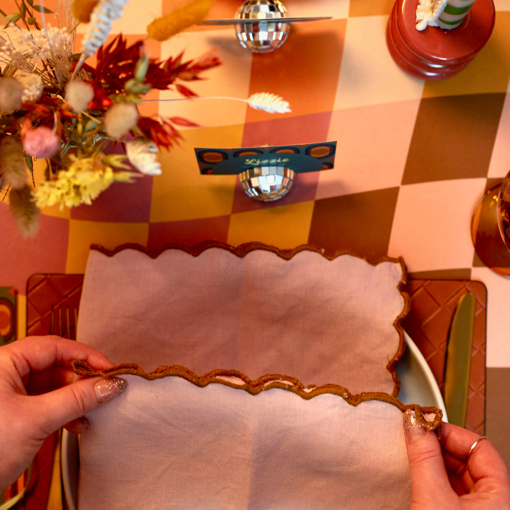 Checkity Check Check Wallpaper in Retro Tones Table scape 2_0368_Temp.jpeg__PID:980e36ec-b1a7-4c54-87b1-9aa8ff9d8b9a