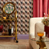 Roomset of vintage geometric wallpaper in caramel, black on vintage mauve colourway