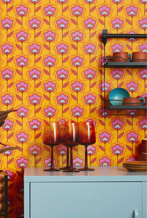 Roomset close-up of floral wallpaper in clementine and magenta