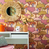 Roomset close-up of tree wallpaper in olive green, earthy orange and grape colourway